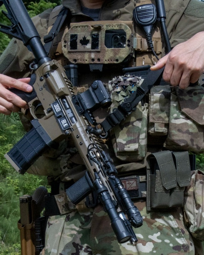 Kilo North Custom operator with FCSF chest rig, CAP admin panel, and rifle - mobile hero crop